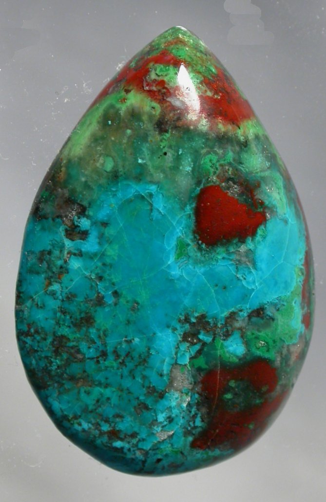 Chrysocolla Parrot Wing  Chrysocolla Gallery selling Chrysocolla Parrot Wing  designer gems stones cabs cabochons Chrysocolla gem silica Chrysocolla in quartz in chalcedony gems stones Hydrated Copper Silicate metaphysical Chrysocolla new age
