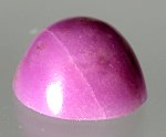 Sugilite gems stones designer gems cabs cabochons gel Sugilite jewelry stones metaphysical new age pictures and info custom cutting Lapidary Lavulite Bustamite Azel Sugwi Richterite