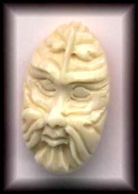 fossil ivory green man carving