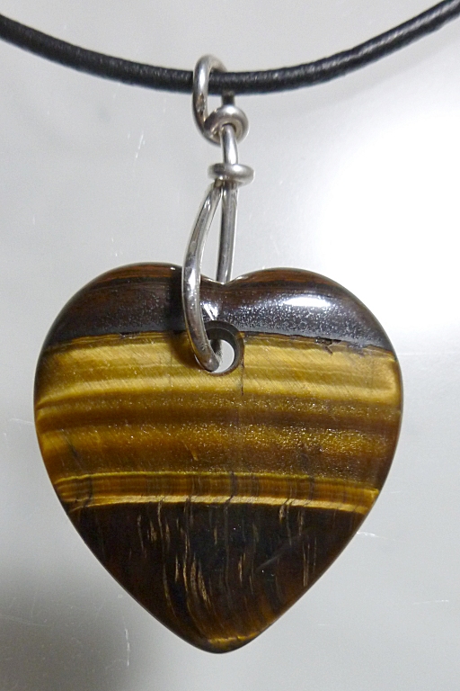 Carved Tiger eye healing heart talisman. Hand carved by Mystic Merchant - Billy Mason Hearts carved hand carved gemstone Hearts agate tourmaline quartz ruby in zoisite crazy lace agate crystals sugilite moldavite pietersite obsidian opall