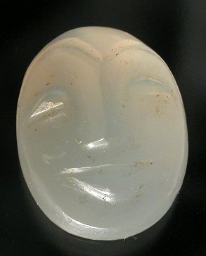 Carved moonstone face cab blue Moonstone gems stones moonstone cabs cabochons carved moonstone faces rainbow moonstone blue moonstone silver moonstone peach moonstone metaphysical new age moonstone