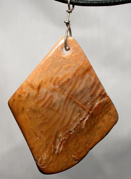 Palm wood petrified pendant