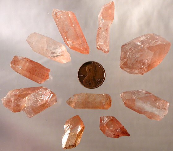 Tangerine quartz crystals red quartz crystal green quartz crystals hematite quartz crystals huellandite red stars cabs cabochons faceted red quartz metaphysical New Age shopping