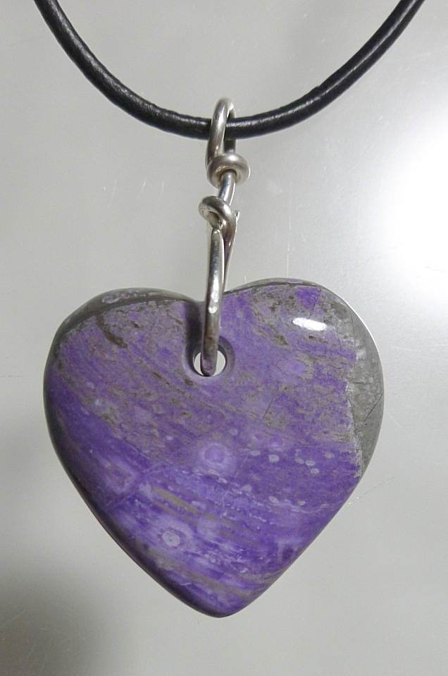 Carved Sugilite healing heart talisman. Hand carved by Mystic Merchant - Billy Mason Hearts carved hand carved gemstone Hearts agate tourmaline quartz ruby in zoisite crazy lace agate crystals sugilite moldavite pietersite obsidian opal
